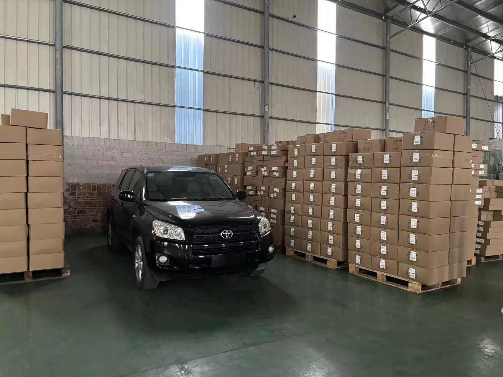 Vehicle inside a China-side receiving and staging warehouse