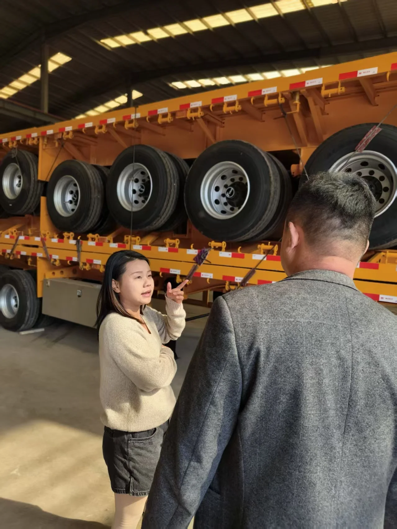 Lillian speaking with a commercial vehicle supplier in China