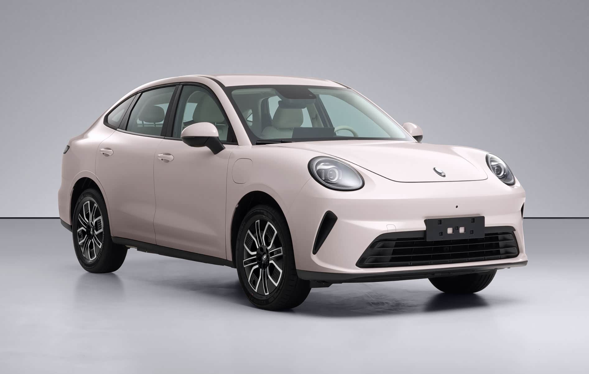 Pink electric GWM Ora 5 sedan shown from the front three-quarter angle