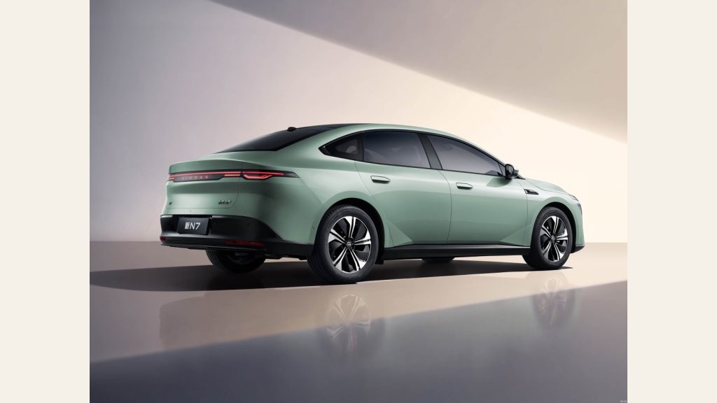 Light green updated Nissan N7 electric sedan from the rear
