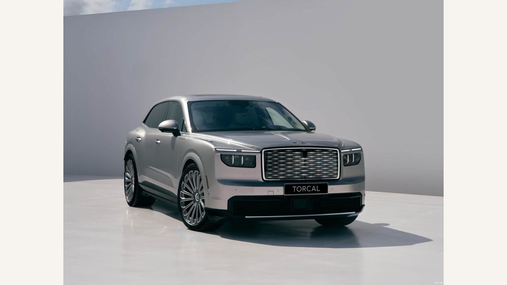 Silver Bentley Torcal electric SUV in a studio