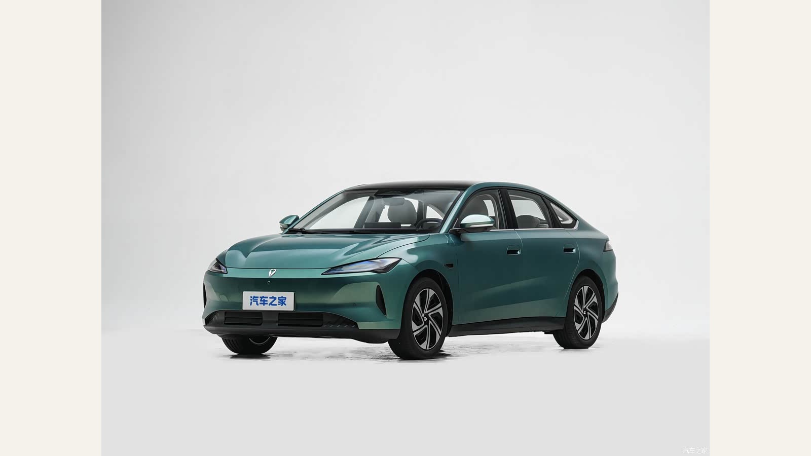 Green Jetta M6 electric sedan in a front three-quarter studio view