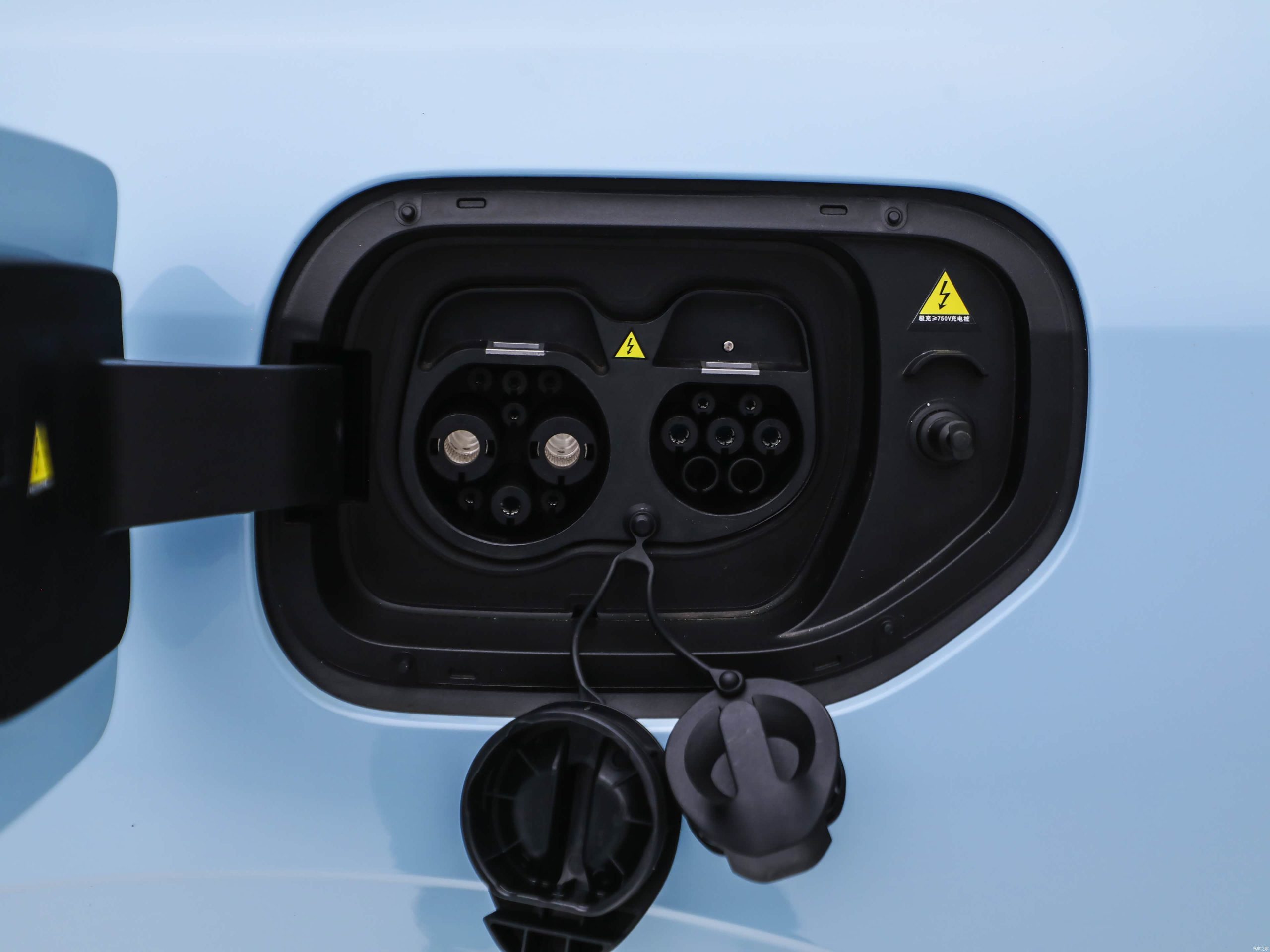 Open charging port on the Geely Galaxy TT electric sedan