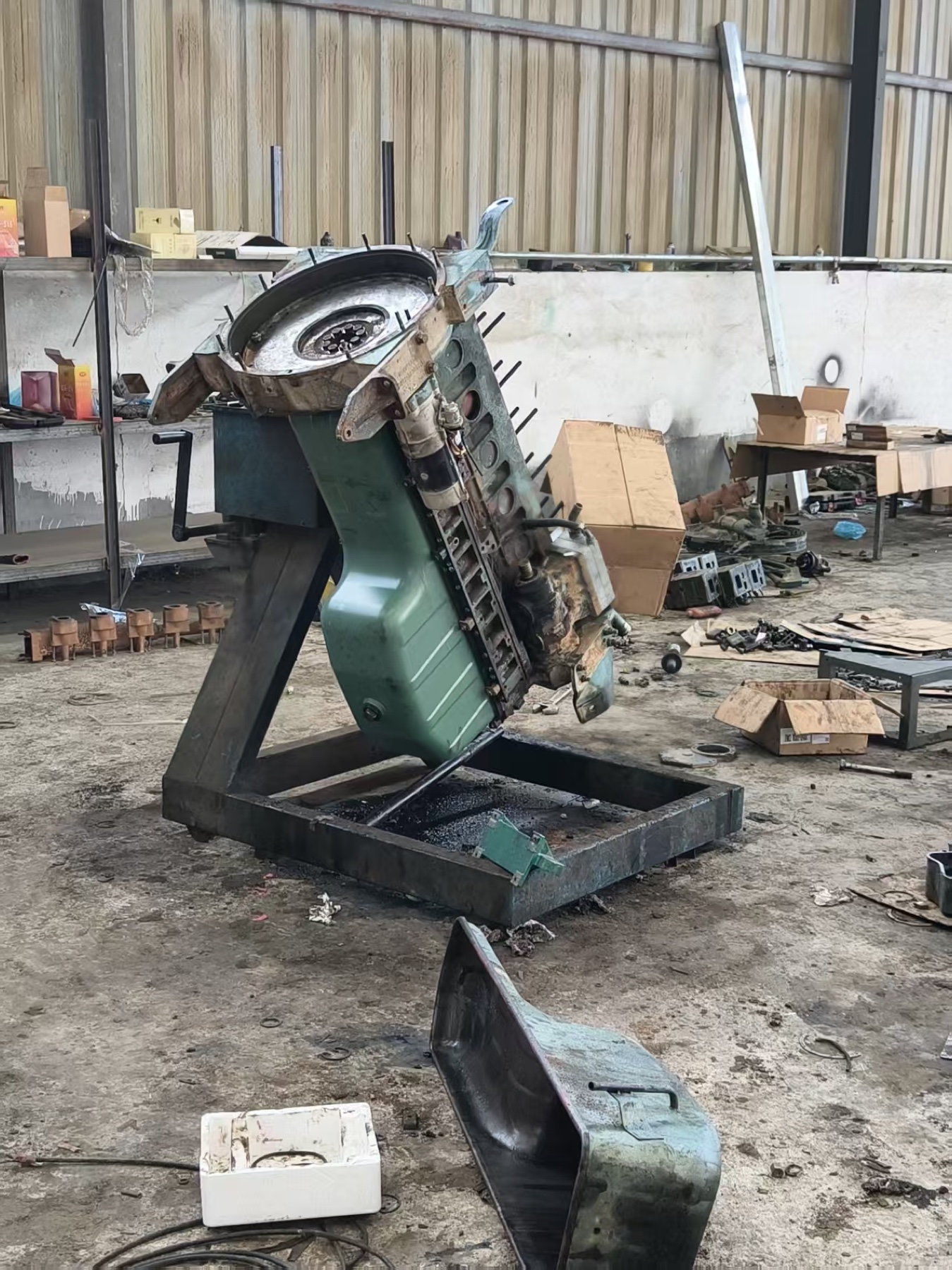 Disassembled truck component examined during supplier and parts review