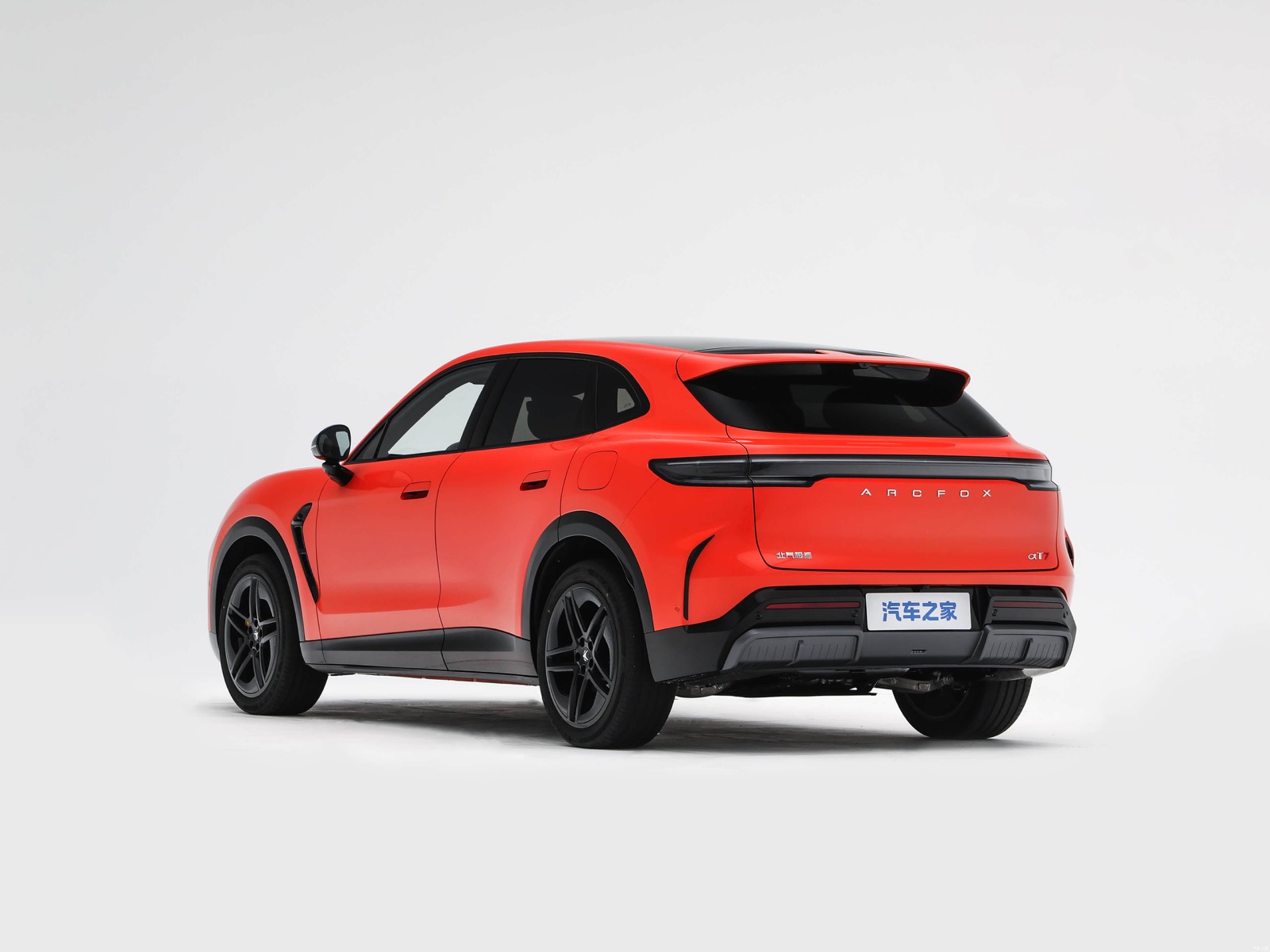 Orange Arcfox Alpha T7 shown from the rear three-quarter angle