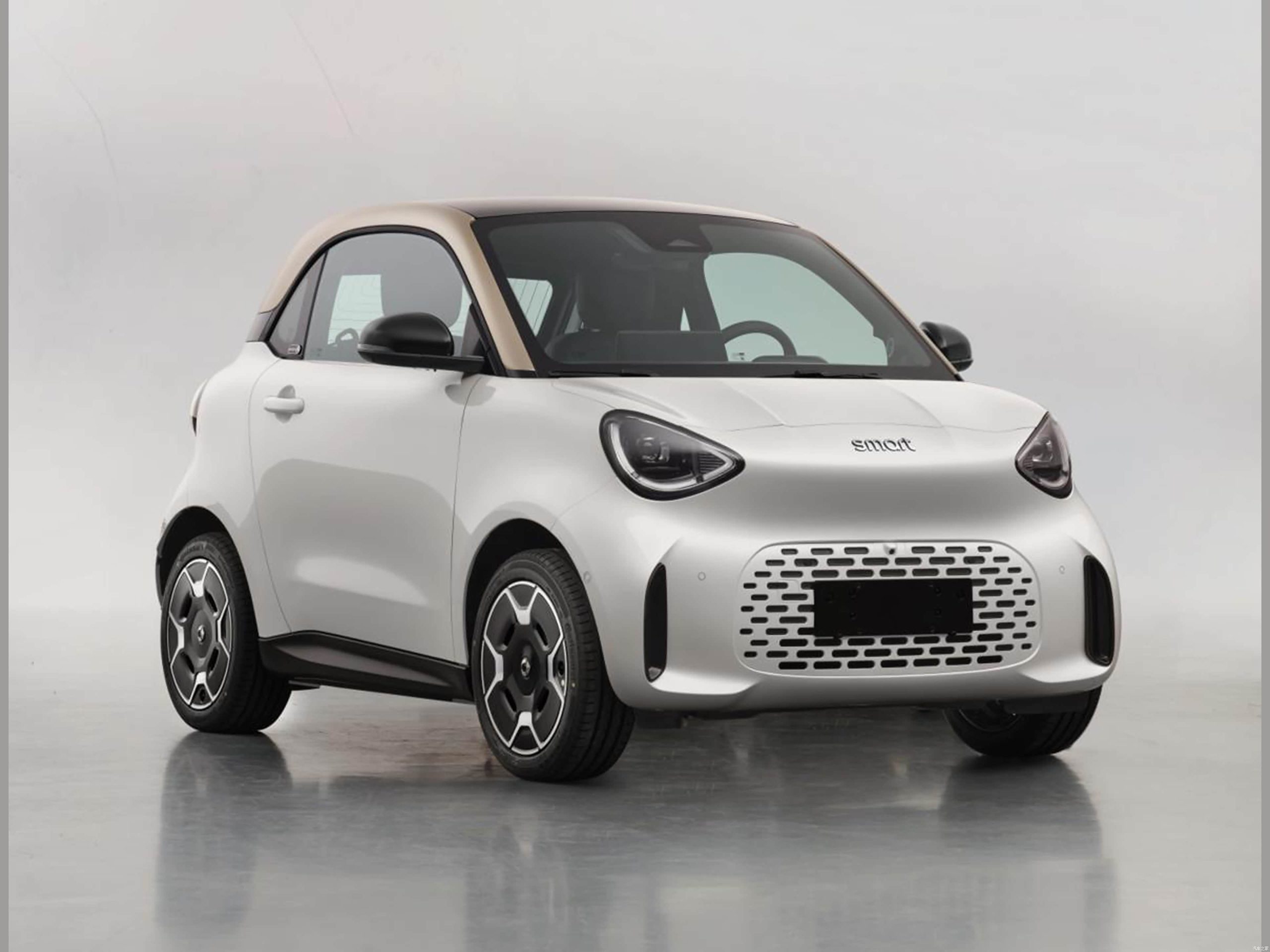 Front three-quarter view of the white smart #2 electric microcar