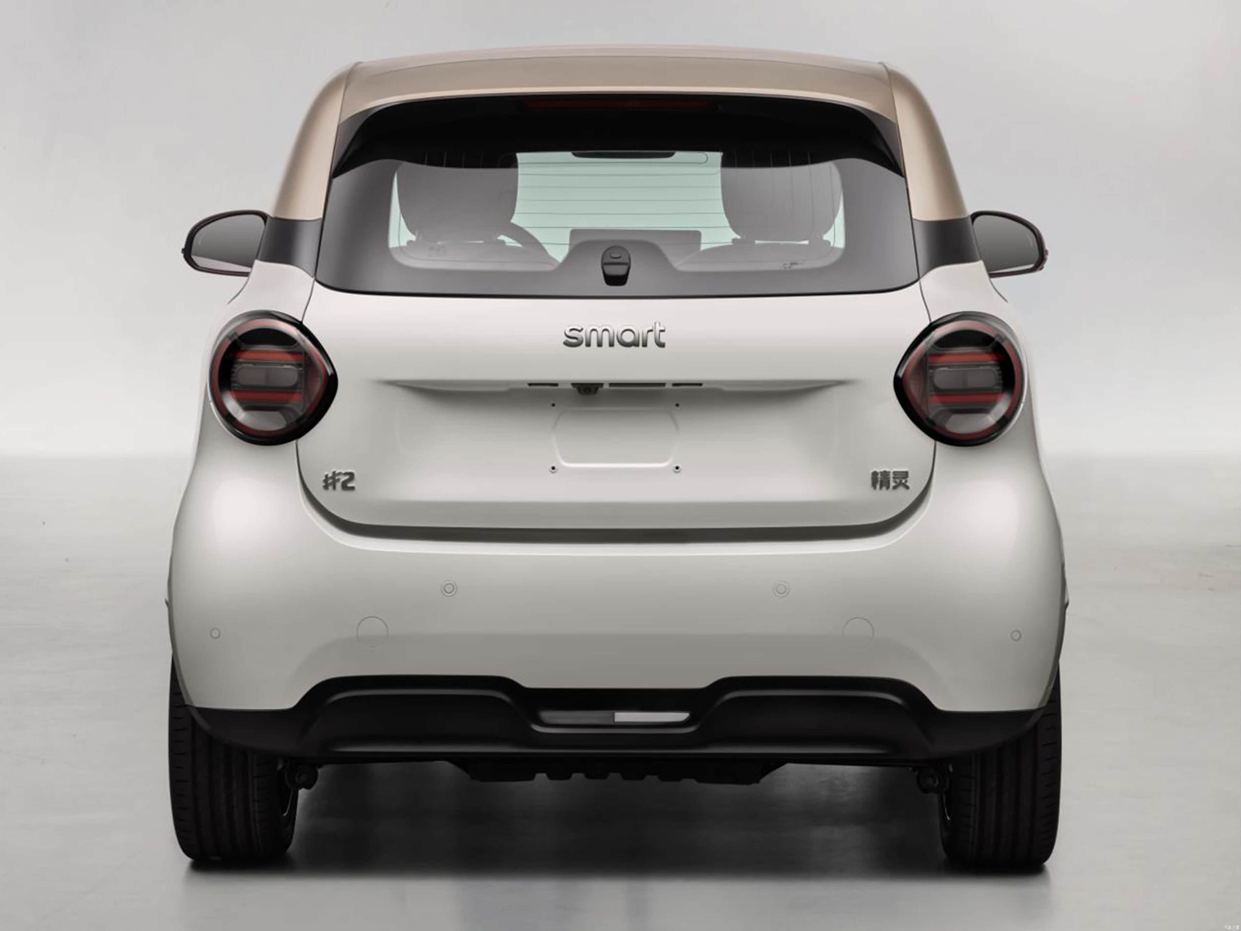 Rear view of the white smart #2 electric microcar