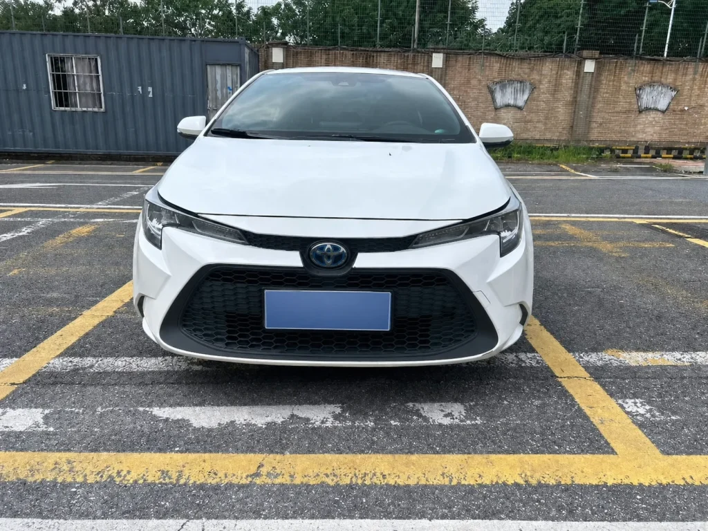 Front view of a white 2020–2021 Toyota Levin prepared for export to Ghana