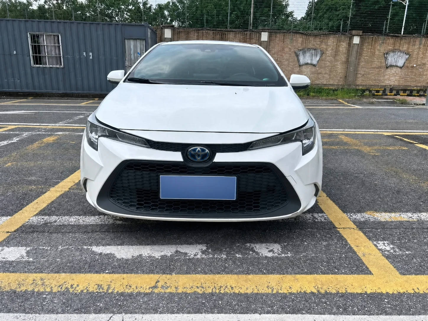Front view of a white 2020–2021 Toyota Levin prepared for export to Ghana