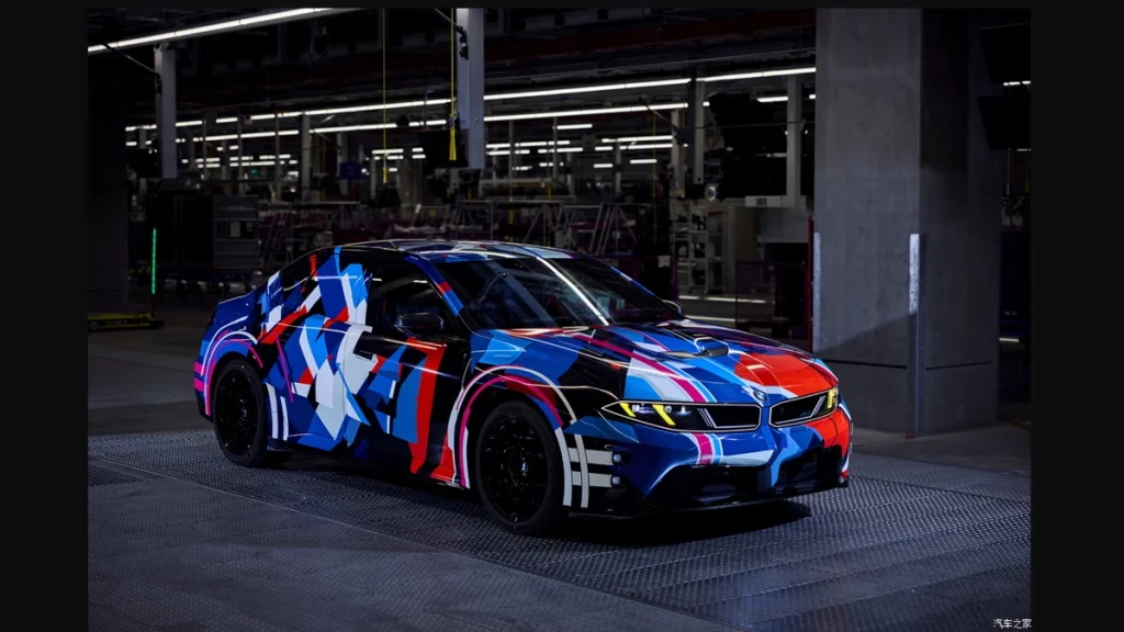 Camouflaged BMW electric M3 production prototype in a factory