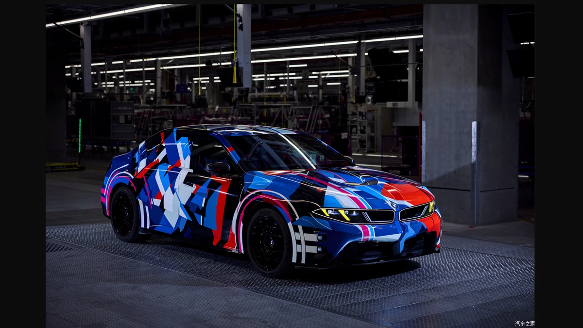 Camouflaged BMW electric M3 production prototype in a factory
