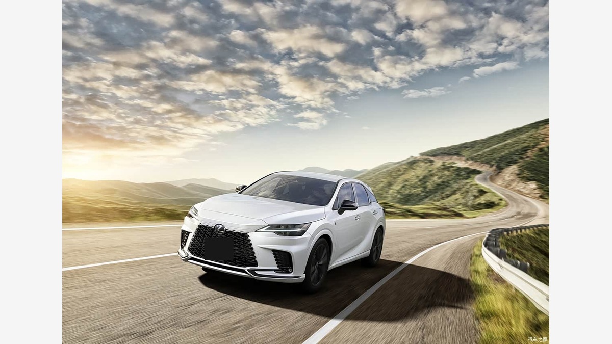 White 2027 Lexus RX driving on a mountain road